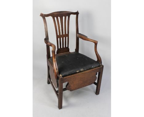 A 19th Century Oak Commode Armchair with Serpentine Top Rail Surmounting Pierced Vase Splat, Deep apron on Square Tapering Le