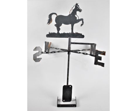 A Late 20th Century Black painted Wrought Iron Weather Vane with Trotting Horse Top, 77cms High 
