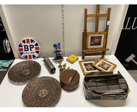 A job lot of assorted collectibles including a cast iron BP plaque, shipping unavailable