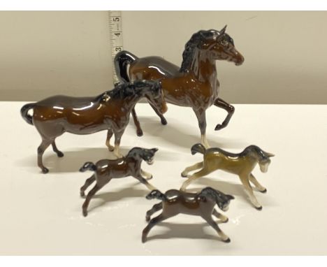 A selection of assorted ceramic horse figurines including Beswick and Royal Doulton, shipping unavailable