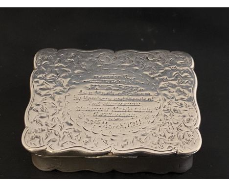 A hallmarked silver snuff box with dedication front for 1910