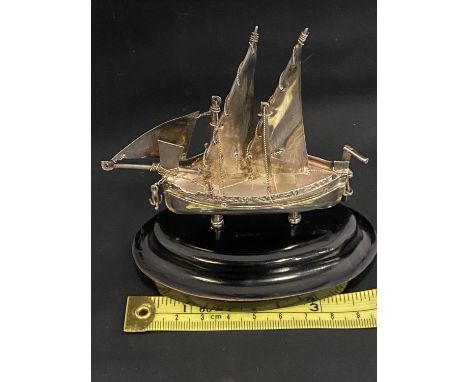 A hallmarked silver model of a Chinese Junk