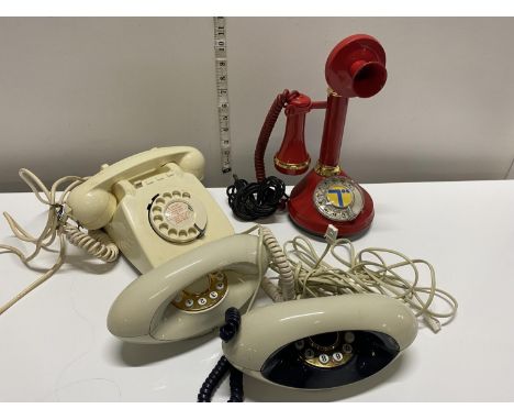 A selection of vintage style telephones including candlestick phone, shipping unavailable