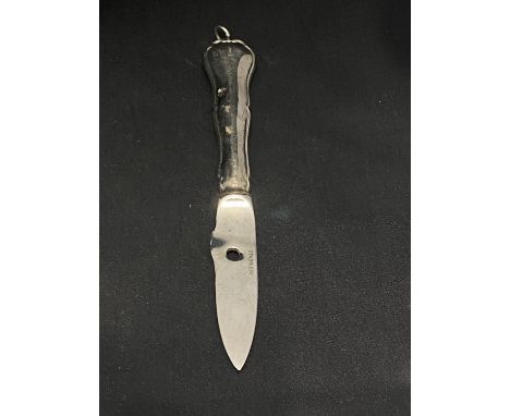 A unusual continental silver handled Chippendale crab knife