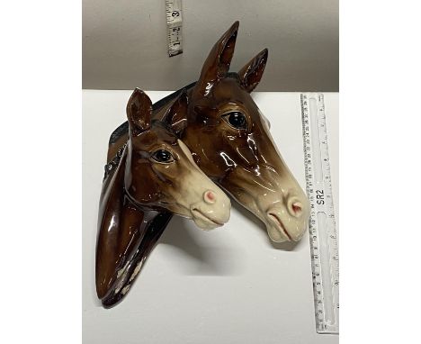 A vintage wall hanging ceramic bust of two horses by Gema