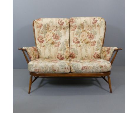 ERCOL An Ercol model 9132 Evergreen two-seater sofa, with maker's label, Overall 141x110x88cm, seat 110x45x45cm. 
