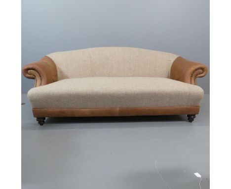 TETRAD - A contemporary Taransay Midi three seater scroll-arm sofa, upholstered in Harris Tweed and studded tan leather. RRP 