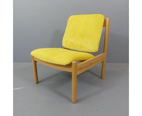 ERCOL - A contemporary model 772 easy chair, with maker's label. 