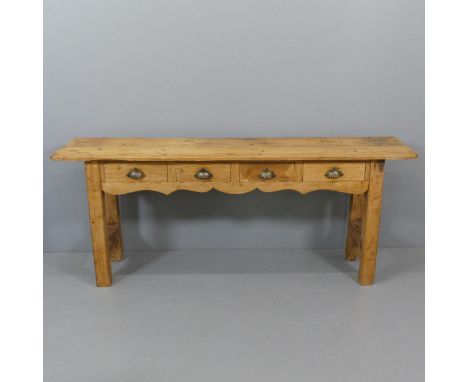 A vintage pine console table, with plank top and four frieze drawers. 181x73x43cm. 