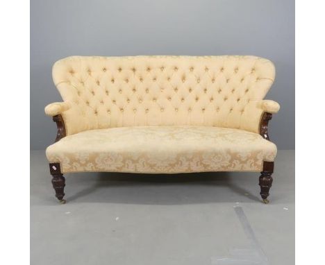 A late Victorian mahogany and button-back upholstered settee. Overall 168x93x85cm, seat 128x40x60cm.Stain to upholstery on le