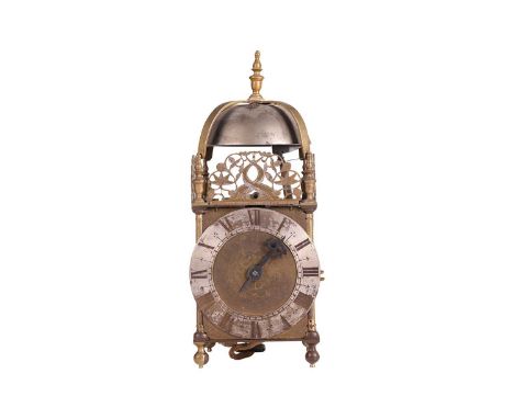 A part late 17th-century brass, 30-hour lantern clock, by an undescribed maker, with urn finial cast bell and decorative fret