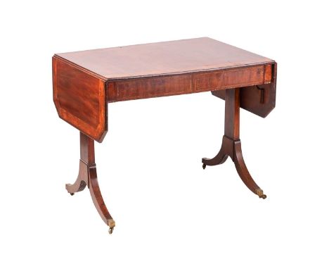 Wilkinson &amp; Sons, of Ludgate Hill, London; A Regency mahogany two-flap sofa table, the top with canted corners and board 
