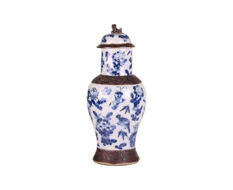 A large Chinese blue and white porcelain baluster vase and cover, late Qing Dynasty/Early Republic, the hat-shaped cover with