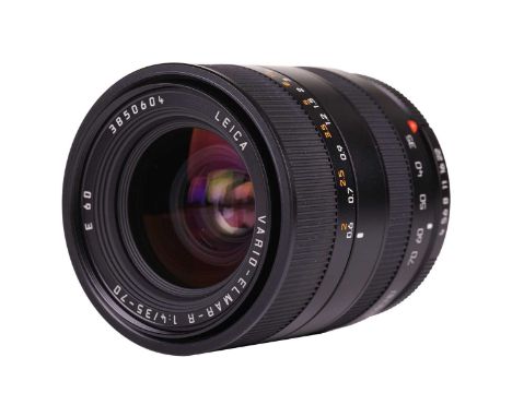 A Leica Vario Elmar R 1:4/35 70mm E 60 lens, black, serial number 3850604, in original retail box, with leather case and pape