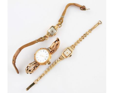 A lot to include a yellow metal cased wrist watch, the white enamel dial having hourly Roman numeral markers with minute trac