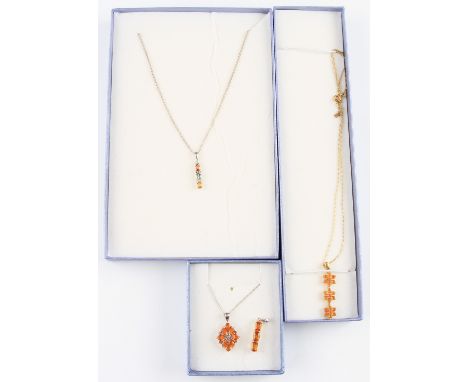 Two fire opal pendants, with chains, an orange stone pendant, along with a multi-coloured gemstone pendant with chain, all st