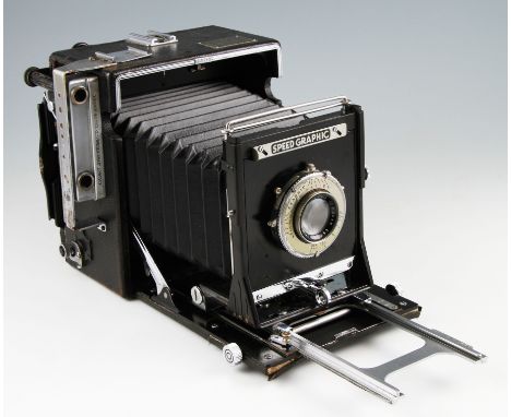 A Graflex speed graphic 5x4 camera fitted with 127mm F3.5 Ektar lens and Rada R/F back.