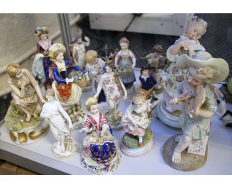 A group of 15 assorted 19th and 20th century continental ceramic figural ornaments depicting various scenes and figures inclu