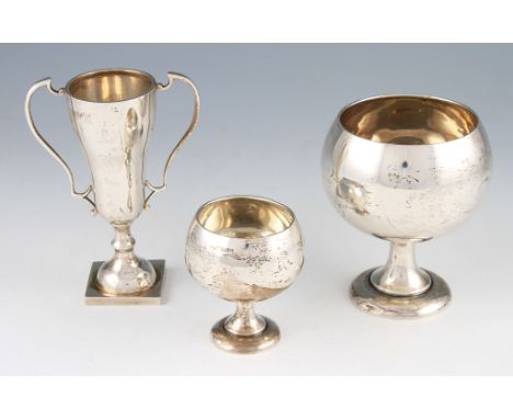 A group of three Indian silver vases, one being a twin handled trophy design, stamped SILVER, makers mark for H & Co. Ltd, tw