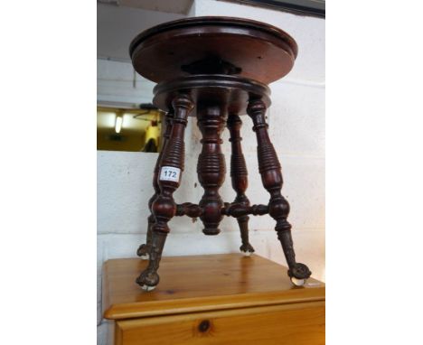 Victorian adjustable piano stool with glass feet
