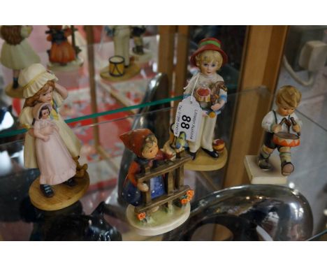 4 child figurines to include 2 Jan Hagara & 2 W Goebel