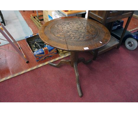 Carved oak tripod table