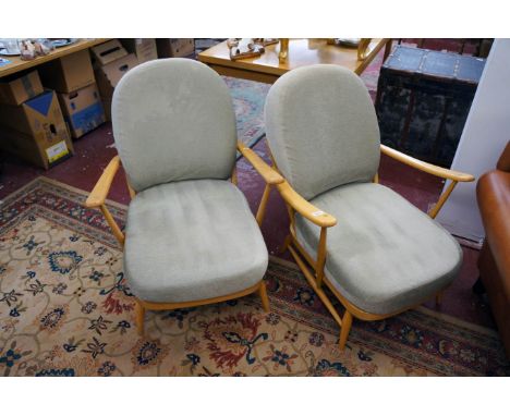 Pair of Ercol armchairs with cushions