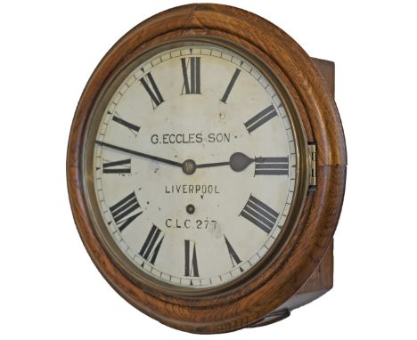 Cheshire Lines Committee 12in dial oak cased railway clock with a spun brass bezel and a going barrel movement with A shaped 