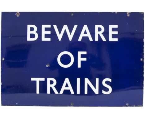 BR(E) enamel station sign BEWARE OF TRAINS. In very good condition with a few small face chips. Measures 27in x 18in.