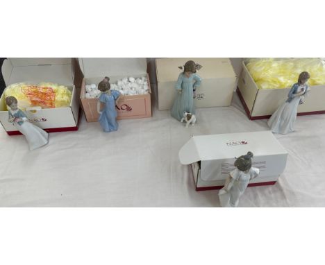 Selection of 5 boxed Nao figures includes girl with dog, girl with cake etc