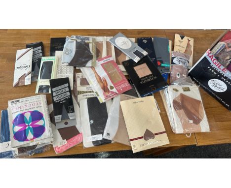 Selection of vintage tights and stockings in original packaging 