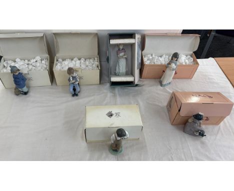 Selection of 6 Boxed Nao figures includes boy cuddling dog, girl with plate etc