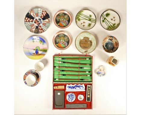 A collection of oriental ceramic pieces, to include a Japanese Canton bowl, an Imari scalloped dish, a pair of Asian hand pai