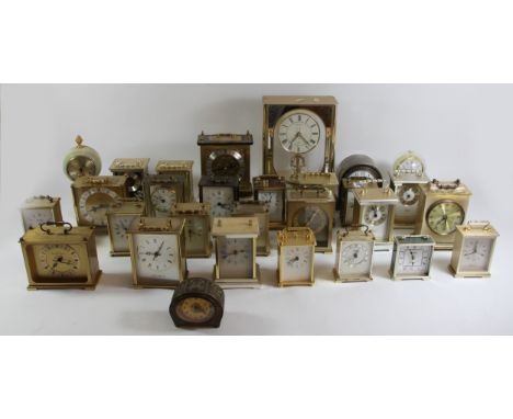 A collection of mid 20th Century and later carriage/mantle clocks, to include a Garrard 8 day mantle clock (boxed), a silver 