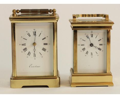 A French brass cased manual wind carriage clock, beveled edge glass panels, open jeweled escapement, movement stamped made in