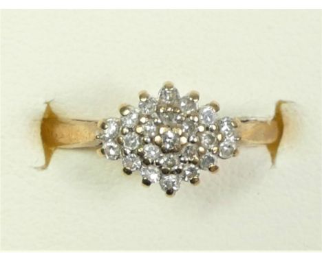 A 9ct gold and diamond cluster ring, set with single cut stones, stated weight 0.20cts, M 1/2, 2.2gm 
