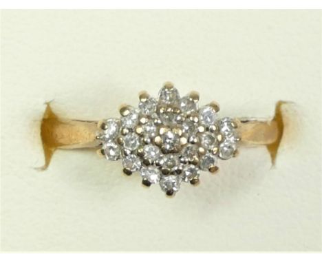 A 9ct gold and diamond cluster ring, set with single cut stones, stated weight 0.20cts, M 1/2, 2.2gm 