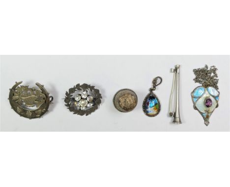 A Victorian silver sentimental brooch, Birmingham 1890, in the form of a basket of flowers and crescent, a silver hunting hor