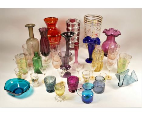A large collection of glassware, to include 1970s art glass vases, crystal glass bowls, drinking glasses, water jugs, claret 