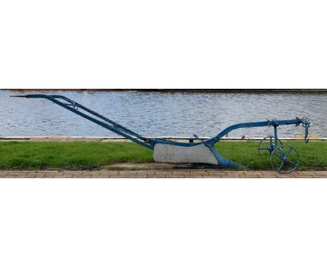 A Gregory, Newcastle, plough, single axle gauge wheels, single share, dual handles, cast iron, blue, 340cm 