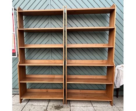 A pair of Ikea six height freestanding open bookshelf units, 198 x 93 x 32 cm, together with an Ikea two door glazed bookcase