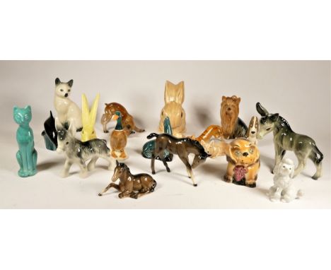 A collection of ceramic animal models, to include a Beswick horse, faul and duck, a sylvac rabbits, dog and a fox, Kingston p