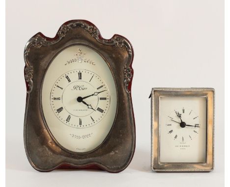 R. Carr - sterling silver framed desk clock, hallmarked Sheffield 1994 - H:19cm, together with a smaller AR1.D.Norman desk cl
