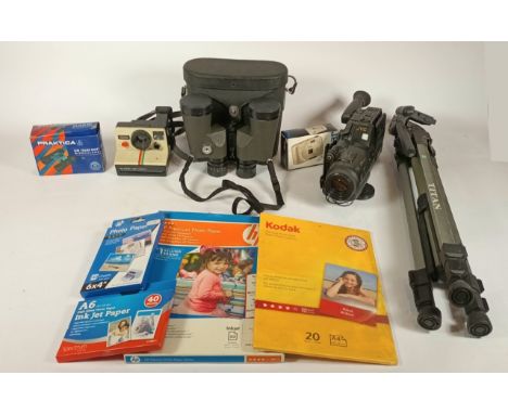 A substantial collection of cameras, binoculars, photography accessories, and photography paper to include, Polaroid, Praktic
