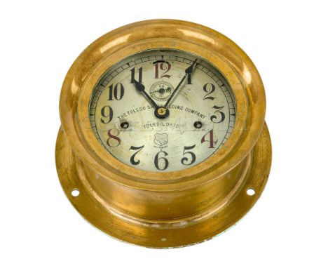 AN AMERICAN BULKHEAD SHIP’S CLOCK FOR THE TOLEDO SHIPBUILDING COMPANY CIRCA 1900 the 6½in. silvered dial with maker’s mark fo