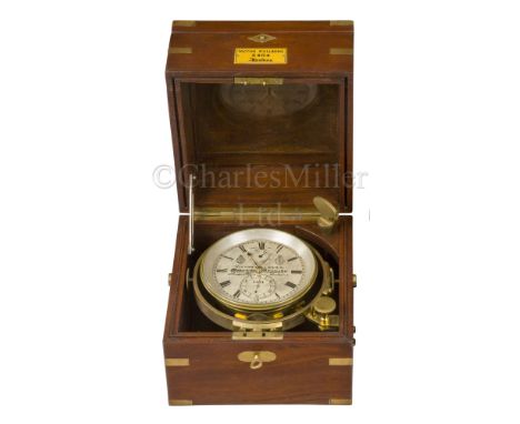 The following lot is sold not subject to return A TWO-DAY MARINE CHRONOMETER the 4in. silvered dial bearing signature and num