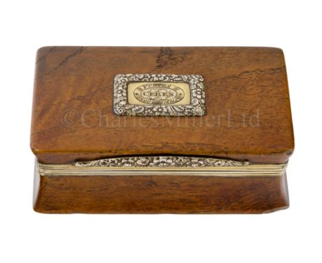A GEORGE III SILVER GILT MOUNTED SHIP’S TIMBER OAK SNUFF BOX marks for London 1818, mounted on the cover with a foliate borde