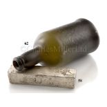 † † A DUTCH EAST INDIA COMPANY (V.O.C.) SILVER INGOT SALVAGED FROM THE ROOSWIJK CARGO, CIRCA 1739