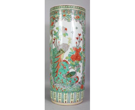 A LARGE CHINESE FAMILLE VERTE PORCELAIN STICK STAND, decorated with large panels of exotic birds and foliage, the base unglaz