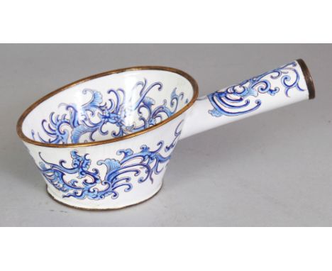 A CHINESE CANTON ENAMEL HANDLED BOWL, of silk-iron form, decorated with stylised phoenix reserved on a white ground, 5.75in l